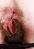 Sia Wood in black leather and knee-high boots from ATK Natural & Hairy Sia Wood from ATK Natural & Hairy